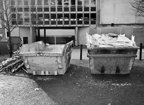 Construction site with Builders Waste South West London collection vehicles