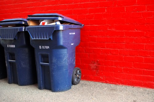 Rubbish collection trucks in South West London streets